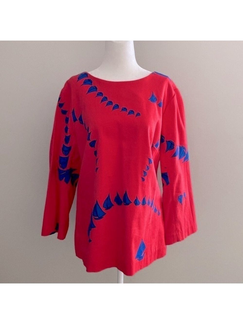 Elizabeth McKay sail boat red blouse
